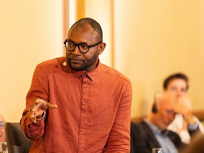 Fiston Mwanza Mujila speaking on stage of Europe 24 at Literaturhaus Hamburg.© Daniel Müller